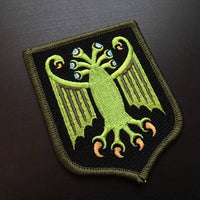 Elder Thing Heraldic Shield Embroidered Patch (Arkham Variant): Iron-on