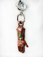Traveler's Trinkets: Forged Gauntlet Charm