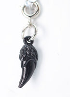 Traveler's Trinkets: Dragon Fang Charm