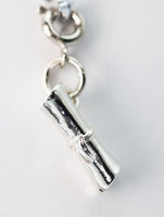 Traveler's Trinkets: Scroll Charm