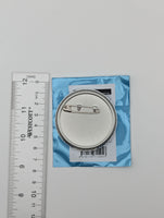 Eiden Nu: Carnival Can Badge